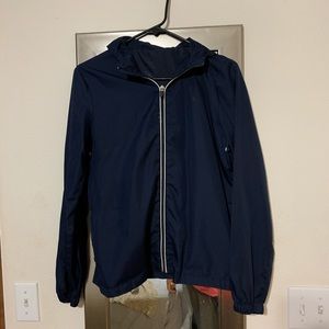 Blue hooded windbreaker